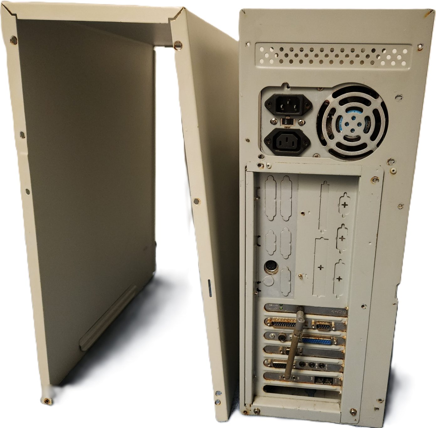 Computer case with a side panel removed, showing ports and internal structure.